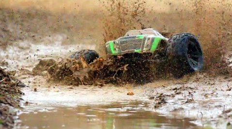 rc trucks in mud and water